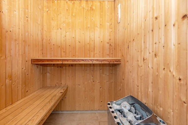 Foto van Luxe strandhuis met zwembad - Vakantiehuis in Odder - Sauna