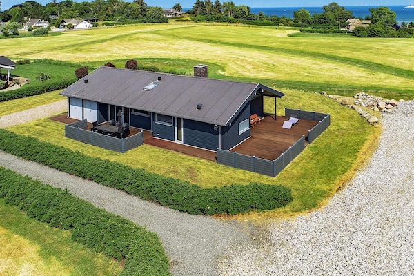 Foto van Vakantiehuis aan de kust met spa en sauna - Vakantiehuis in Rudkøbing - Outdoor