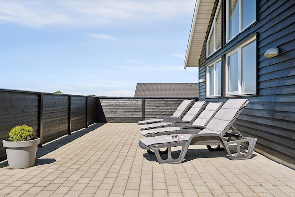 Foto van Luxe strandhuis met zwembad - Vakantiehuis in Bogense - Outdoor