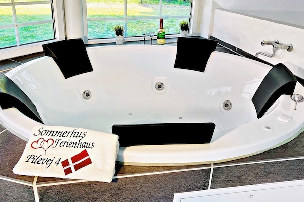 Foto van Luxe vakantieverblijf vlakbij het strand - Vakantiehuis in Væggerløse - Spa