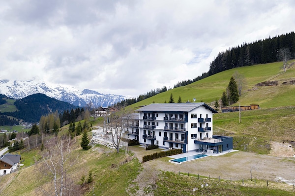 Foto van Apartment met infinity pool - Vakantiehuis in St. Martin am Tennengebirge - ExteriorSummer
