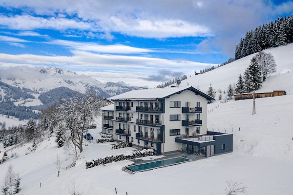 Foto van Apartment met infinity pool - Vakantiehuis in St. Martin am Tennengebirge - ExteriorWinter