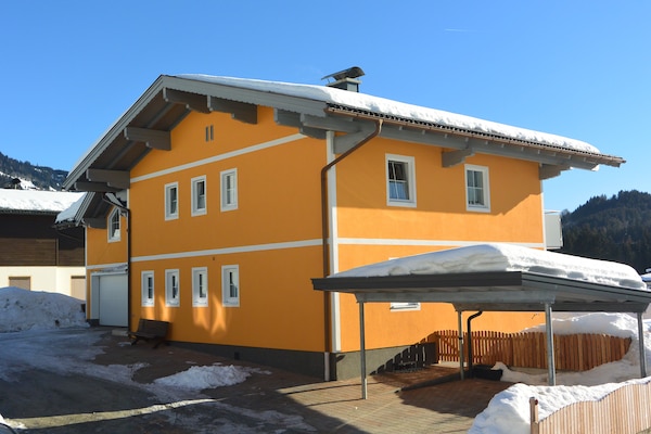 Foto van Landhuis in Goldegg bij Skilift - Vakantiehuis in Goldegg - Weng - ExteriorWinter