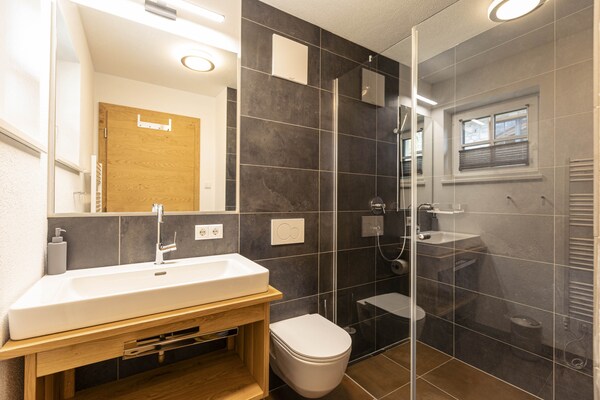 Foto van Premium vakantiehuis # 1B met sauna - Vakantiehuis in Uttendorf - BathRoom