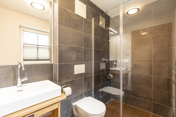 Foto van Premium vakantiehuis # 1B met sauna - Vakantiehuis in Uttendorf - BathRoom
