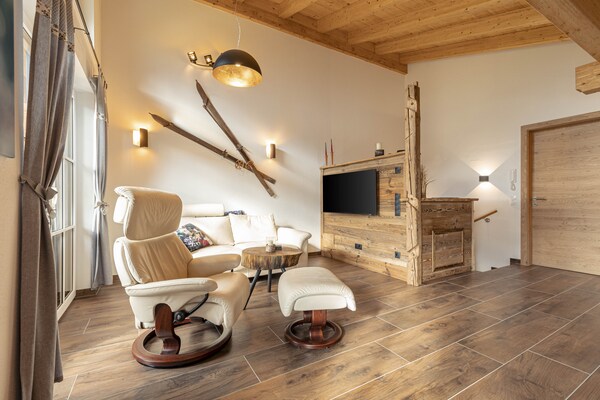 Foto van Premium vakantiehuis # 1B met sauna - Vakantiehuis in Uttendorf - LivingRoom