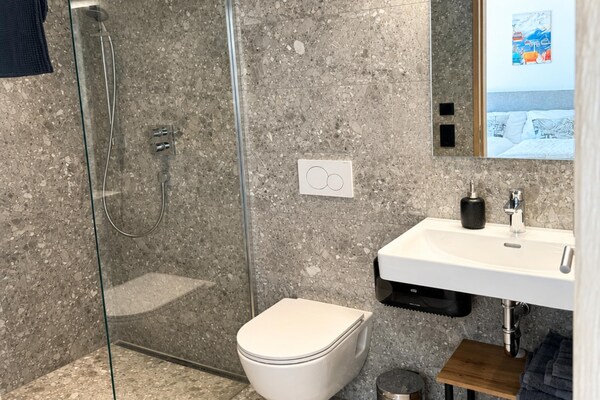 Foto van Ski-in/ski-out appartement Monte Central - Vakantiehuis in Neukirchen - BathRoom