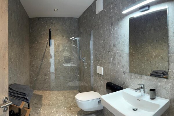 Foto van Ski-in/ski-out appartement Monte Central - Vakantiehuis in Neukirchen - BathRoom