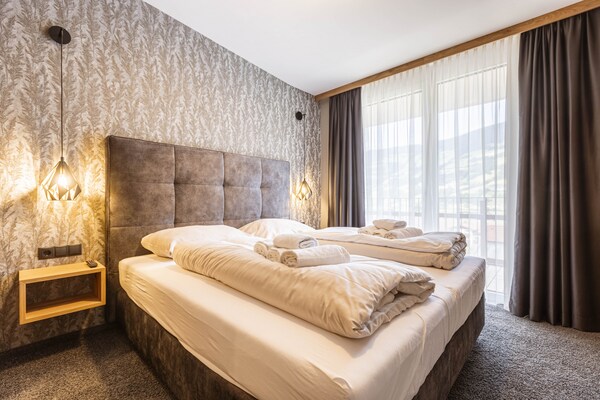 Foto van Premium appartement in Tirol met gedeeld zwembad - Vakantiehuis in Fügen - BedRoom