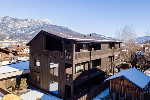 Foto van Premium vakantieappartement met sauna en tuin - Vakantiehuis in Haus im Ennstal - ExteriorWinter