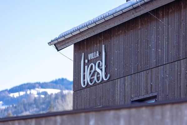 Foto van Premium vakantieappartement met sauna en tuin - Vakantiehuis in Haus im Ennstal - ExteriorWinter