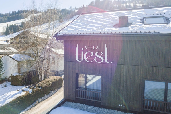 Foto van Premium vakantieappartement met sauna en tuin - Vakantiehuis in Haus im Ennstal - ExteriorWinter