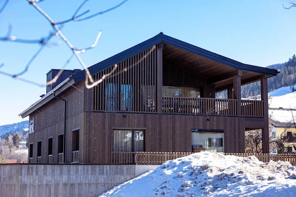 Foto van Premium vakantieappartement met sauna en tuin - Vakantiehuis in Haus im Ennstal - ExteriorWinter