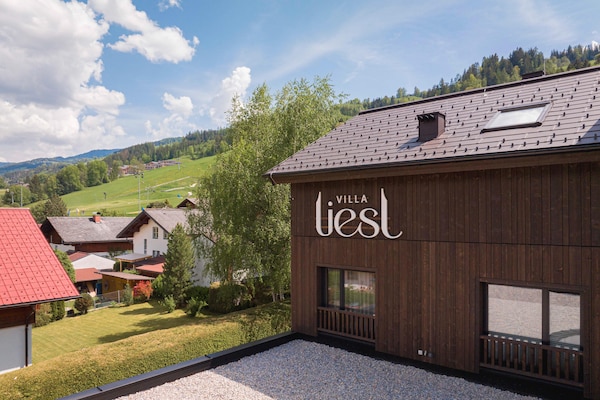 Foto van Premium vakantieappartement met sauna en tuin - Vakantiehuis in Haus im Ennstal - ExteriorSummer