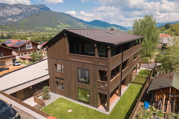 Foto van Premium vakantieappartement met sauna en tuin - Vakantiehuis in Haus im Ennstal - ExteriorSummer