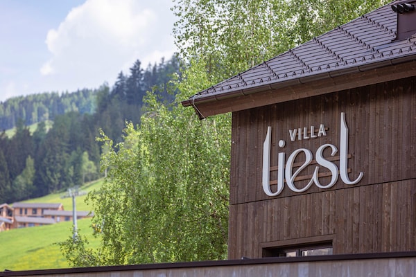 Foto van Premium vakantieappartement met sauna en tuin - Vakantiehuis in Haus im Ennstal - ExteriorSummer