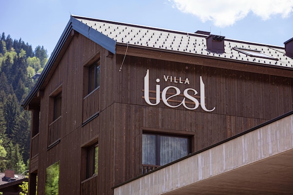 Foto van Premium vakantieappartement met sauna en tuin - Vakantiehuis in Haus im Ennstal - ExteriorSummer