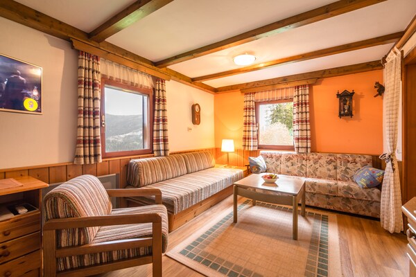 Foto van Chalet in Kalchberg bij Klippitztörl Ski - Vakantiehuis in Bad St. Leonhard-Kalchberg - LivingRoom
