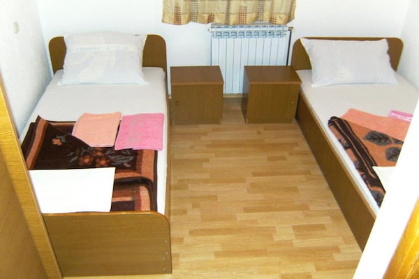 Foto van Quadruple room with Balcony - Vakantiehuis in Medugorje - BedRoom
