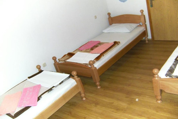 Foto van Quadruple room with Balcony - Vakantiehuis in Medugorje - BedRoom