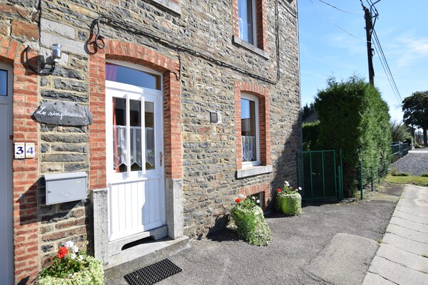 Foto van Chalet in Bovigny met bos en barbecue - Vakantiehuis in bovigny - ExteriorSummer