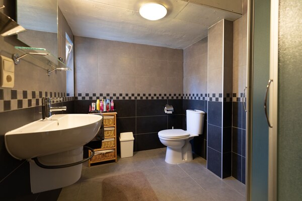 Foto van Leuk vakantiehuis in Oostende bij zee met een terras - BathRoom