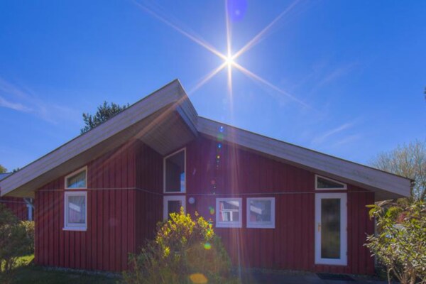 Foto van Vakantiehuis met sauna in vakantiepark Mirow - Vakantiehuis in Granzow - ExteriorSummer