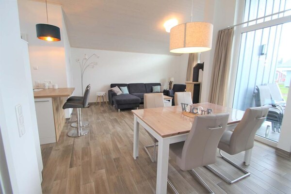 Foto van Vakantiehuis met sauna in vakantiepark Mirow - Vakantiehuis in Granzow - LivingRoom