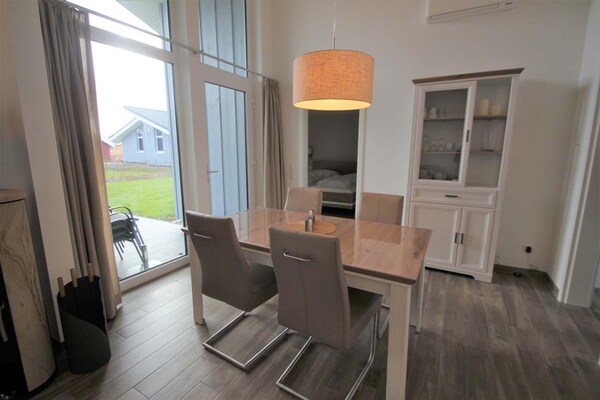 Foto van Vakantiehuis met sauna in vakantiepark Mirow - Vakantiehuis in Granzow - LivingRoom