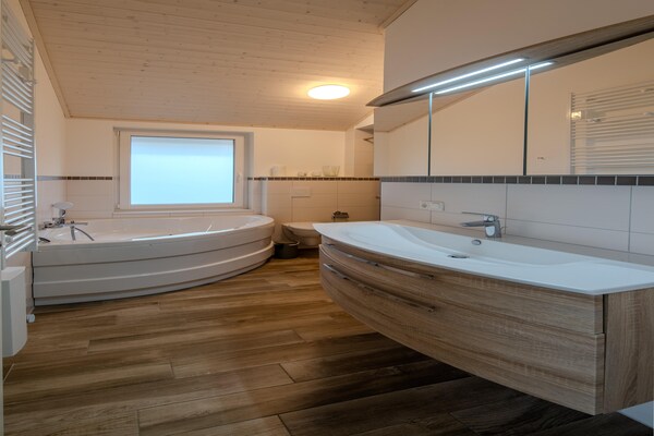 Foto van Vakantiehuis met sauna in vakantiepark Mirow - Vakantiehuis in Granzow - BathRoom