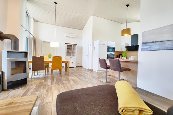 Foto van Vakantiehuis met sauna in vakantiepark Mirow - Vakantiehuis in Granzow - LivingRoom