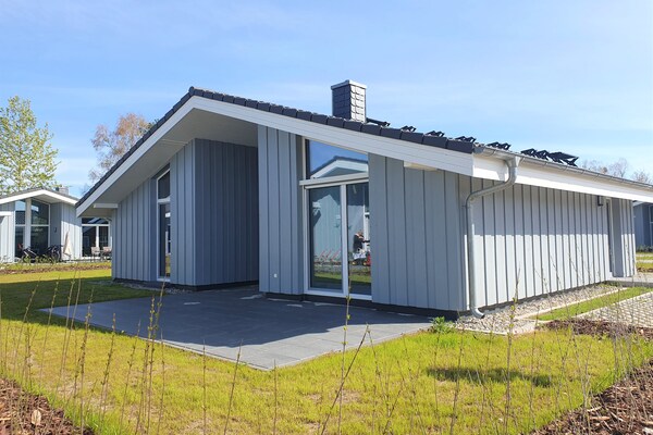 Foto van Vakantiehuis met sauna in vakantiepark Mirow - Vakantiehuis in Granzow - ExteriorSummer