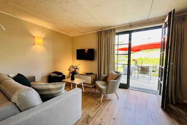 Foto van 15 Boddenblick / Vakantiedorp Klein Stresow - Vakantiehuis in Putbus - LivingRoom