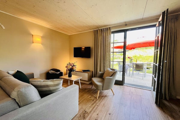 Foto van 15 Boddenblick / Vakantiedorp Klein Stresow - Vakantiehuis in Putbus - LivingRoom
