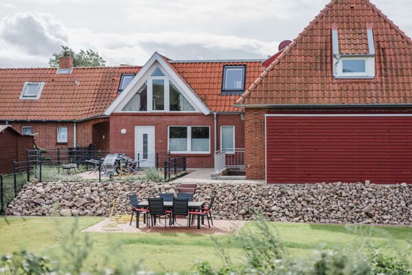 Foto van Torbogenhuus nr. 5 Comfortabele vakantiewoning - Vakantiehuis in Norderney - ExteriorSummer