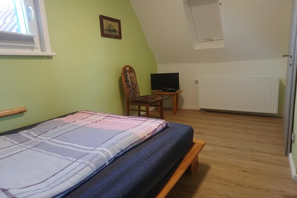 Foto van Vakantiehuis in Blankenburg met tuin - Vakantiehuis in Blankenburg - BedRoom