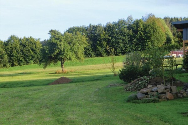 Foto van Chalet in Reinskopf met Haard & Balkon - Vakantiehuis in Schönecken - AreaSummer5KM