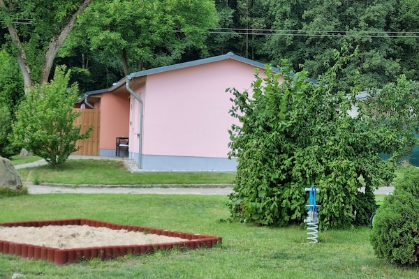 Foto van Rijhuis met terras aan het Groß Labenz-lake - Vakantiehuis in Klein Labenz - ExteriorSummer
