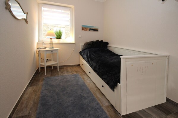 Foto van Vakantiehuis met tuin - Vakantiehuis in Neßmersiel - LivingRoom