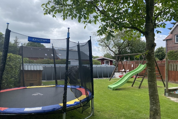 Foto van Rijtjeshuis in Strackholt met verwarmd zwembad - Vakantiehuis in Strackholt - GardenSummer
