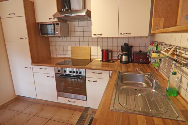 Foto van Rijtjeshuis Dünenwaldhaus Mitte in Trassenheide - Vakantiehuis in Trassenheide - Kitchen