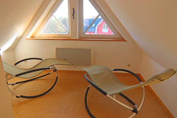 Foto van Rijtjeshuis Dünenwaldhaus Mitte in Trassenheide - Vakantiehuis in Trassenheide - RecreationRoom