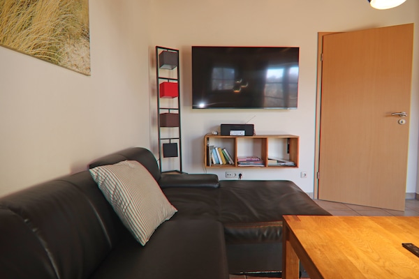 Foto van Rijtjeshuis Dünenwaldhaus Mitte in Trassenheide - Vakantiehuis in Trassenheide - LivingRoom
