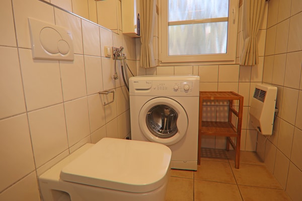 Foto van Rijtjeshuis Dünenwaldhaus Mitte in Trassenheide - Vakantiehuis in Trassenheide - BathRoom
