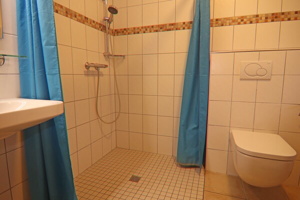 Foto van Rijtjeshuis Dünenwaldhaus Mitte in Trassenheide - Vakantiehuis in Trassenheide - BathRoom