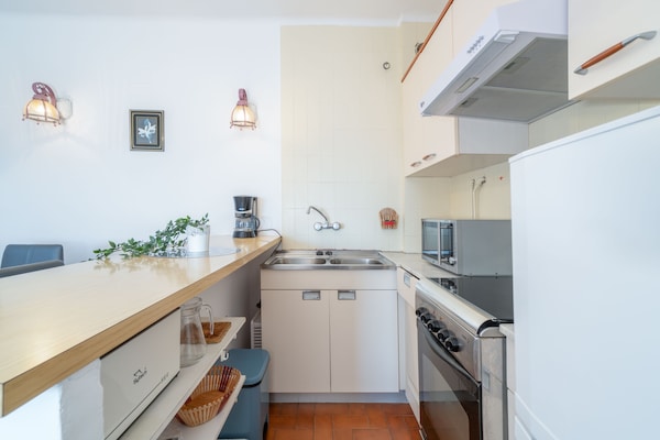 Foto van Appartement aan zee in Empuriabrava met zwembad - Vakantiehuis in Empuriabrava - Kitchen