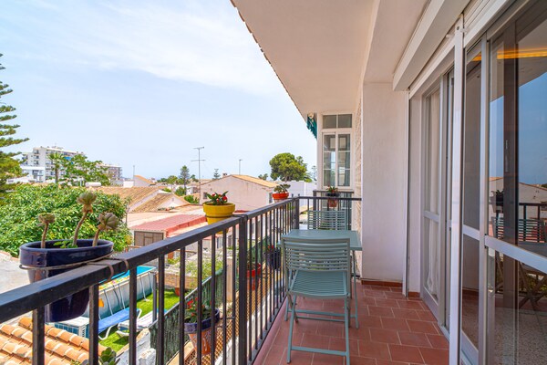 Foto van Vakantiehuis in Nerja met zeezicht - Vakantiehuis in Nerja - TerraceBalcony