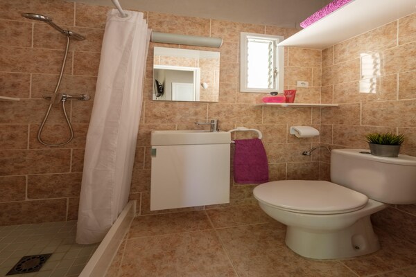Foto van Tropische bungalow met terras - Vakantiehuis in Tarragona - BathRoom