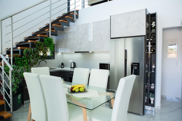 Foto van Privévilla met zwembad en terras - Vakantiehuis in Gouves - DiningRoom