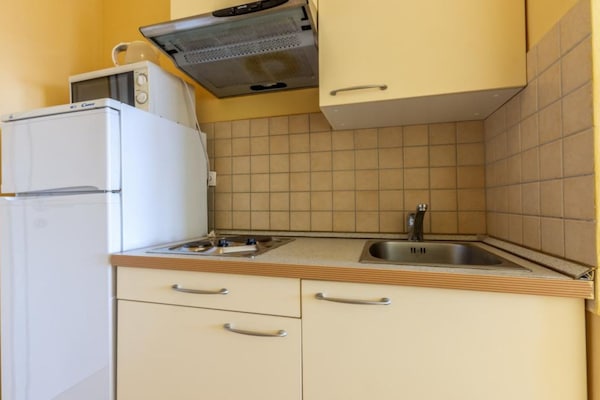 Foto van Premium One Bedroom Apartment with Sea View and Terrace - Kitchen